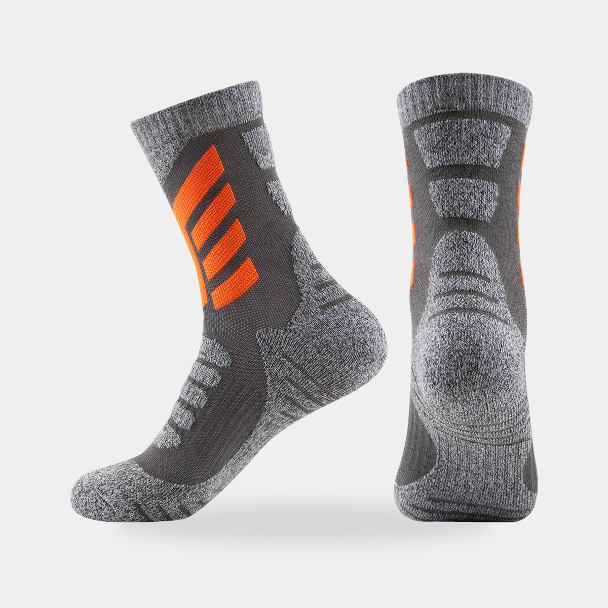 Cushioned crew hiking socks in charcoal with orange chevrons, side and back view