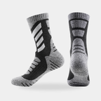 Cushioned crew hiking socks in charcoal with white chevrons, side and back view