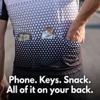 Three rear pockets loaded with a phone and an energy gel while riding