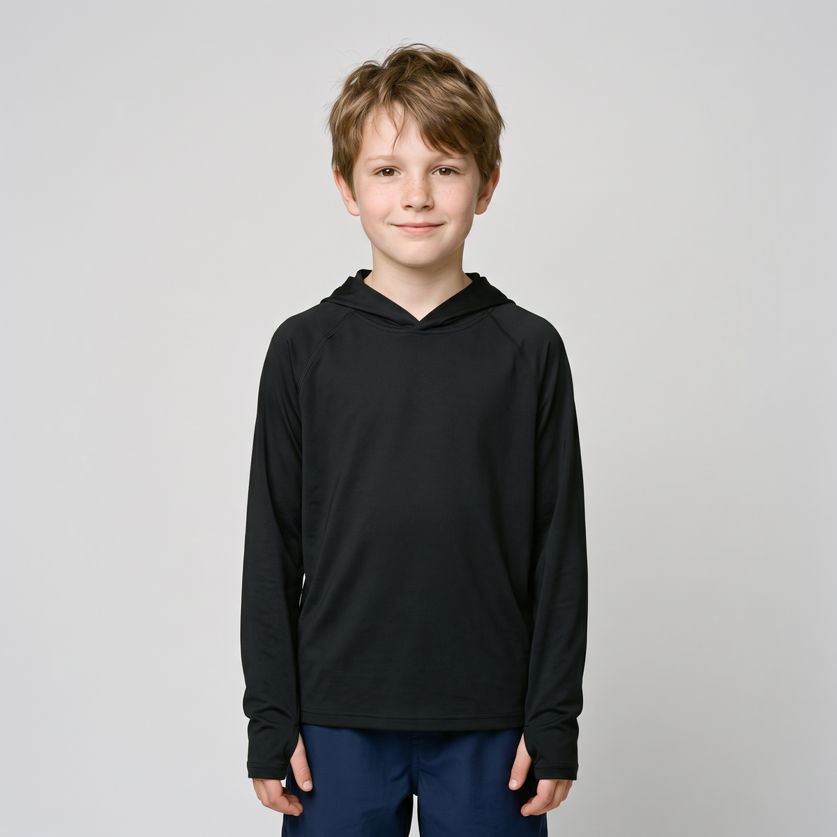 Kids' Sun Hoodie in Black, front view on a child