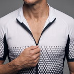Full-length front zip pulled open to mid chest for ventilation