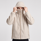 Chimney collar zipped over the mouth with the hood pulled down to meet it