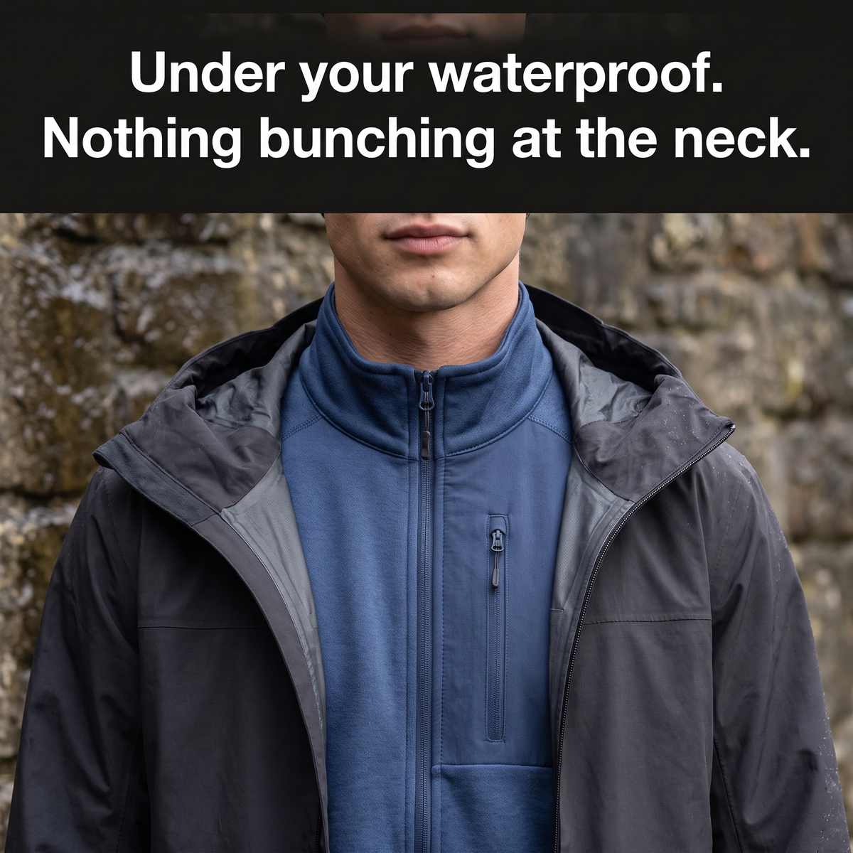 Terrabound Men's Fleece Jacket worn under an open waterproof shell, stand collar sitting flat with nothing bunching at the neck