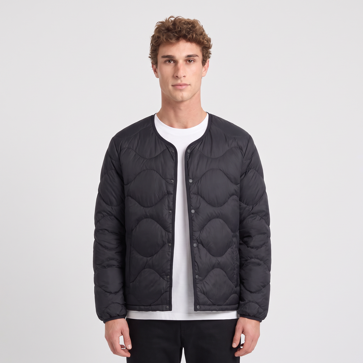 Terrabound Men's Puffer Jacket in Black, collarless quilted down jacket, worn front view