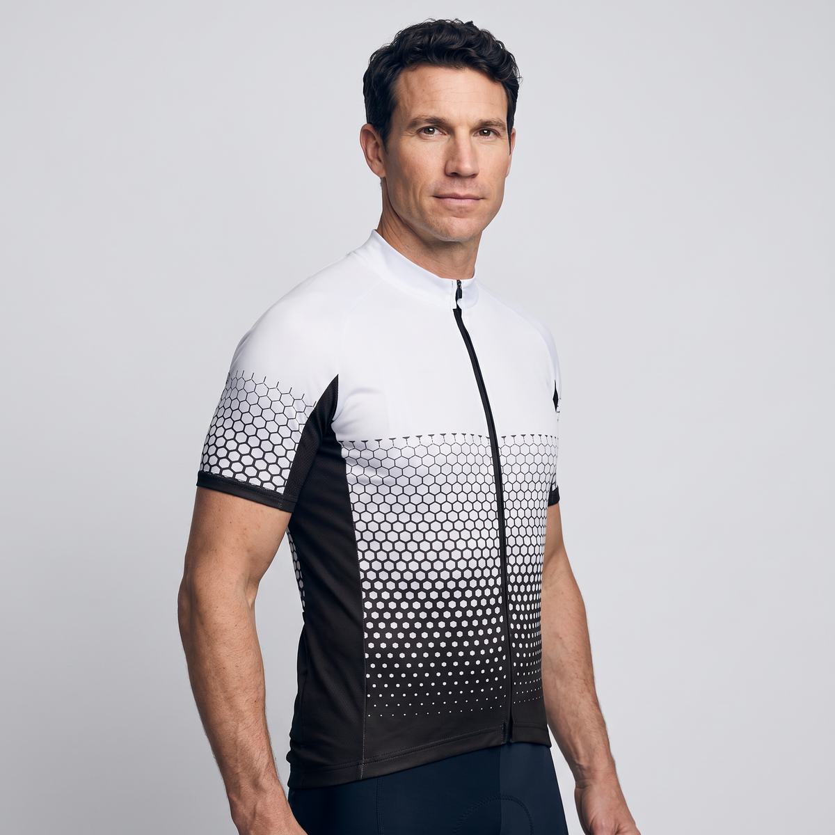 Men's cycling jersey side view showing the contrast underarm panel