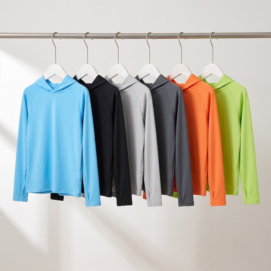 The Kids' Sun Hoodie in all six colours hanging on a rail