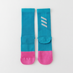 Cycling socks in Reflective Peacock Blue, teal leg with a pink foot