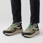 Terrabound Men's Trail Shoes in Olive worn with dark jeans, front view from the knee down