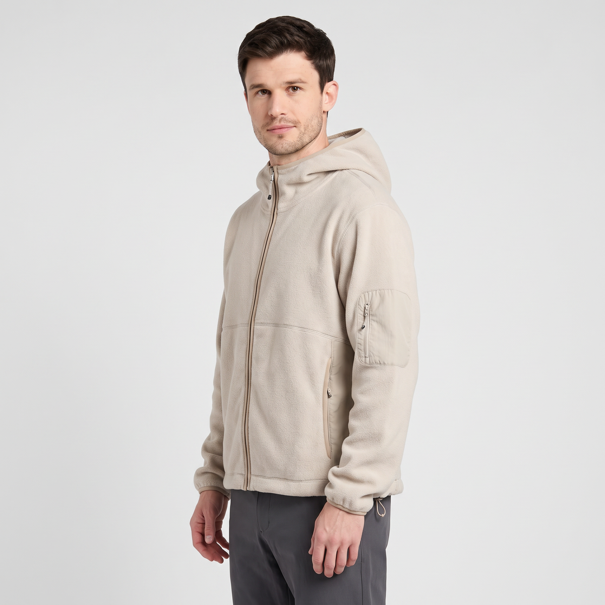 Three quarter side view showing the zipped sleeve pocket