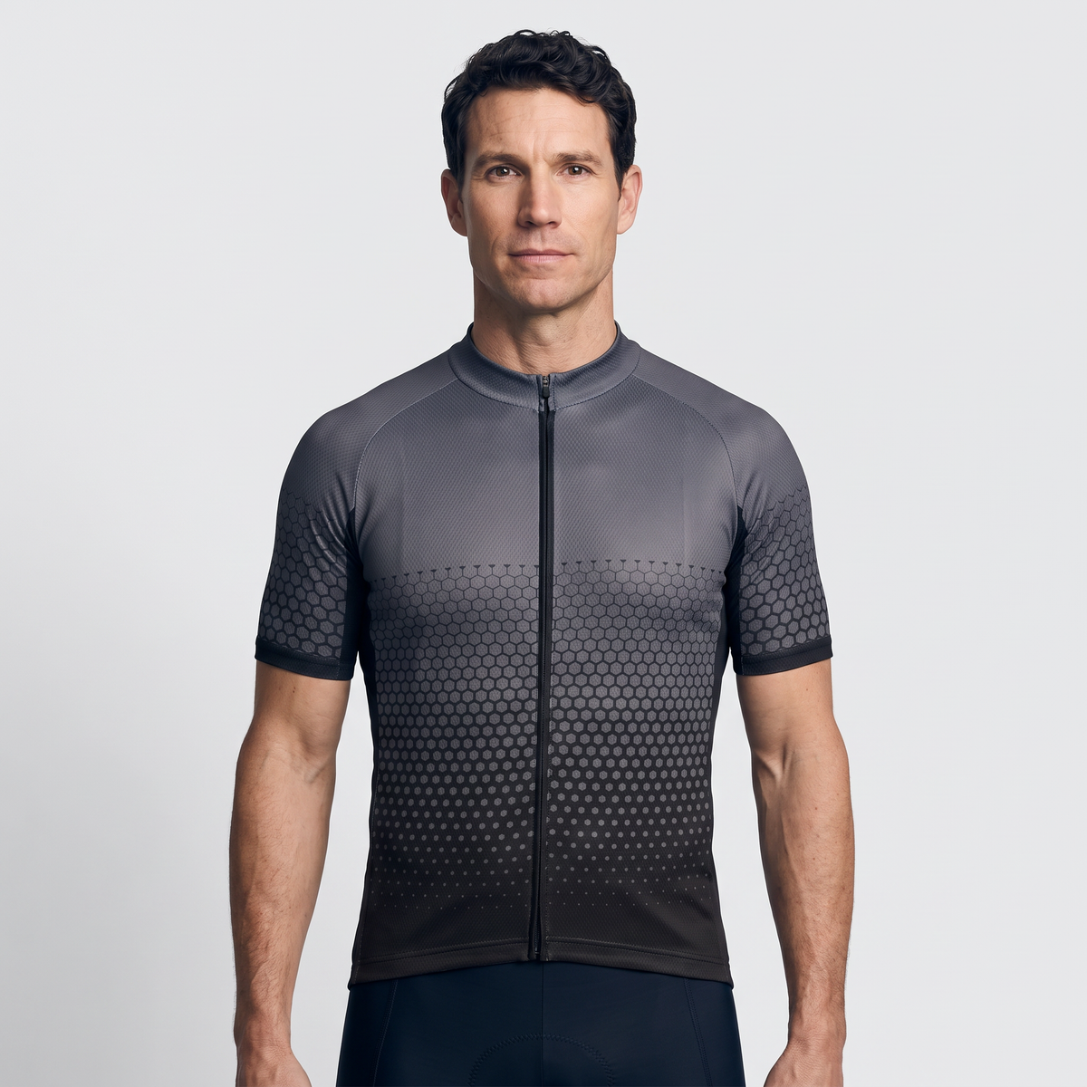 Men's cycling jersey in black, front view worn