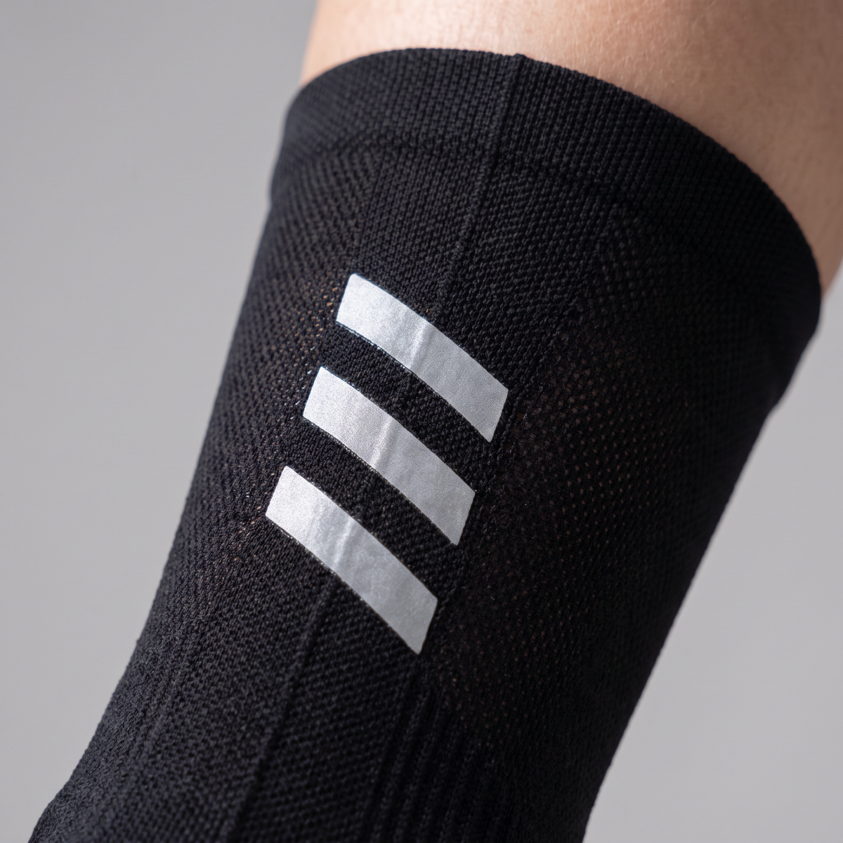Close up of the three reflective bars on the cuff in daylight