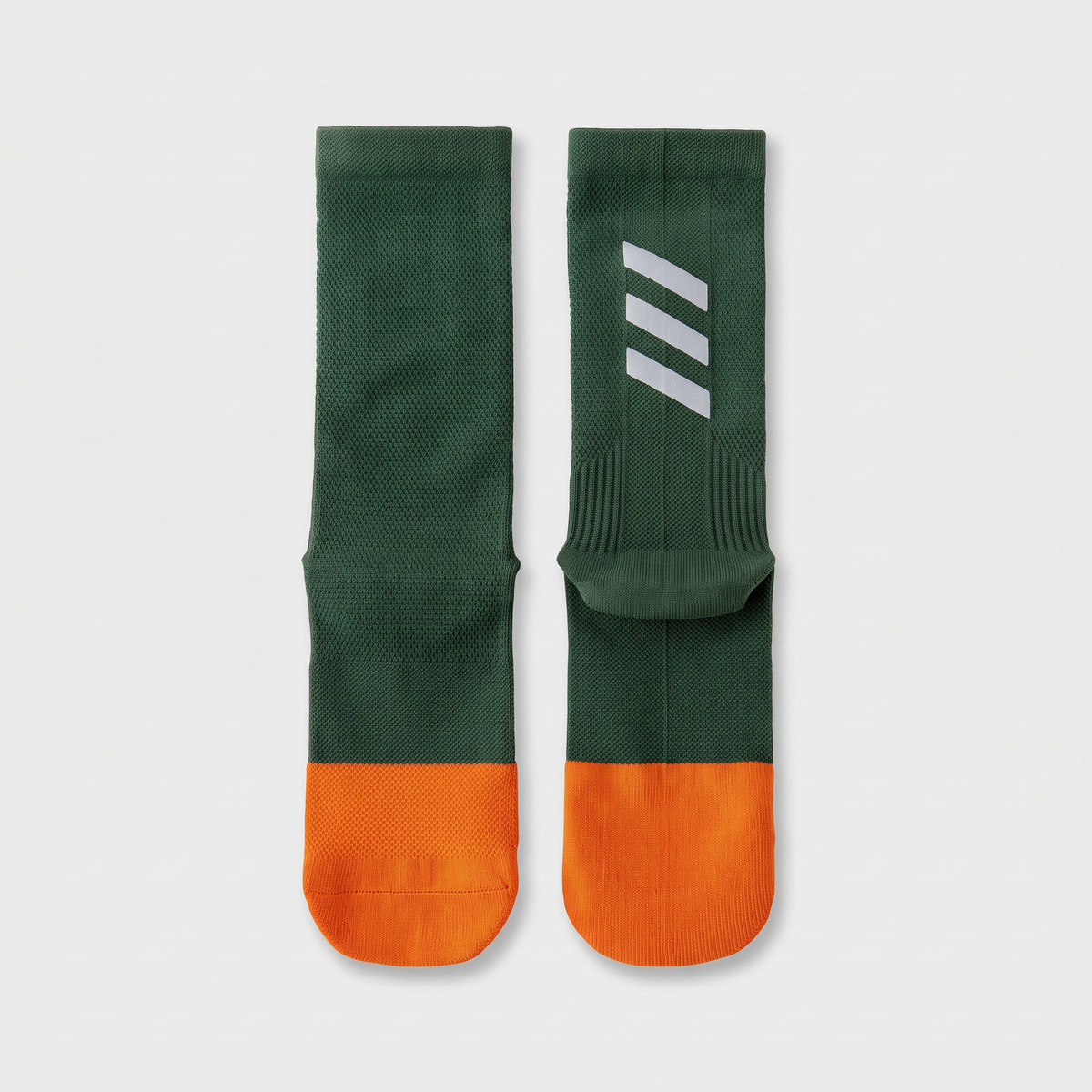 Cycling socks in Reflective Military Green, dark green leg with an orange foot