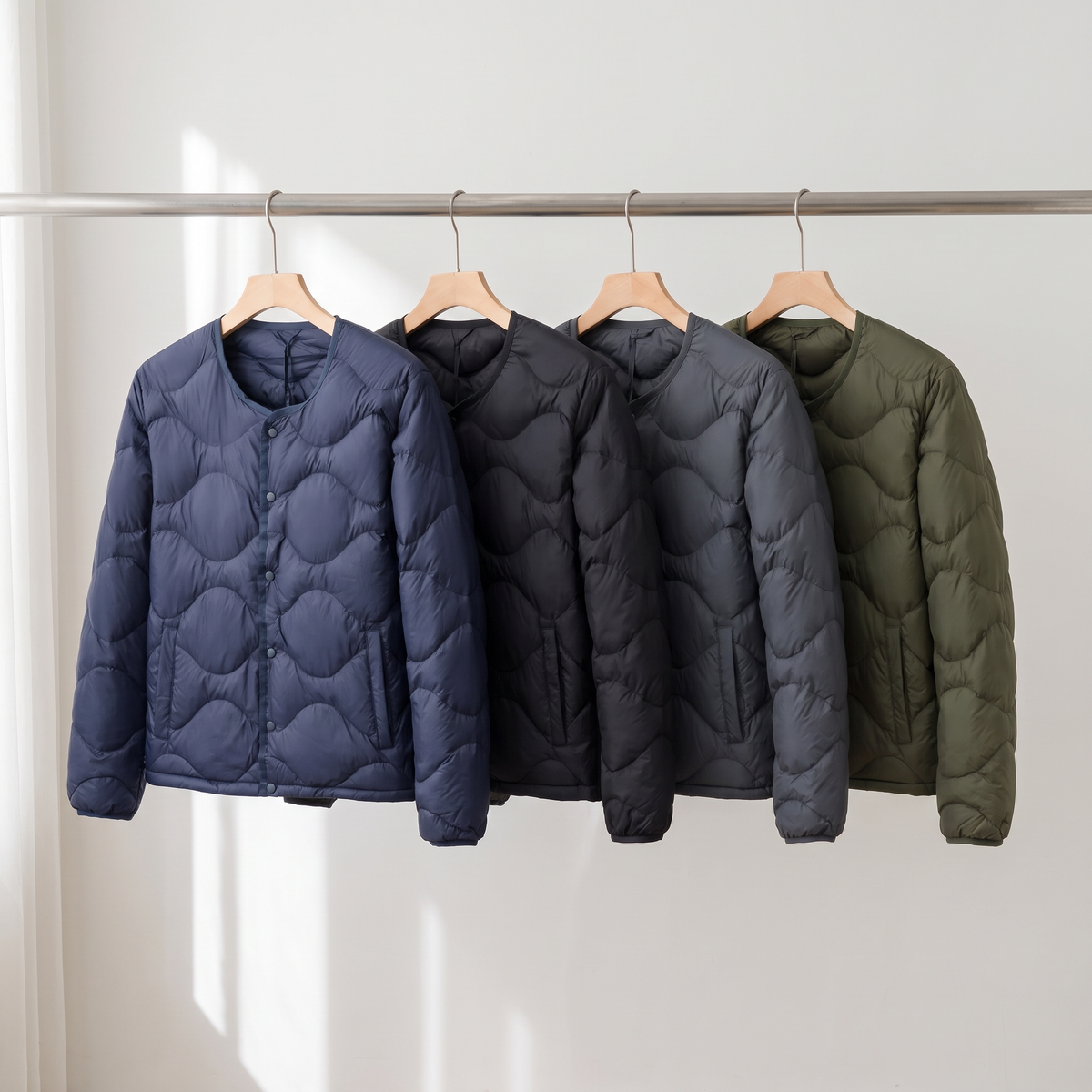 Terrabound Men's Puffer Jacket in Navy, Black, Charcoal and Army Green on a rail