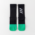 Cycling socks, pair laid flat, showing the reflective bars on each cuff
