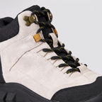 Close-up of the suede upper, speckled laces and speed hooks of the Women's Walking Boots in Cream