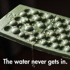 Water beading on the closed-cell foam surface of the folding sit mat