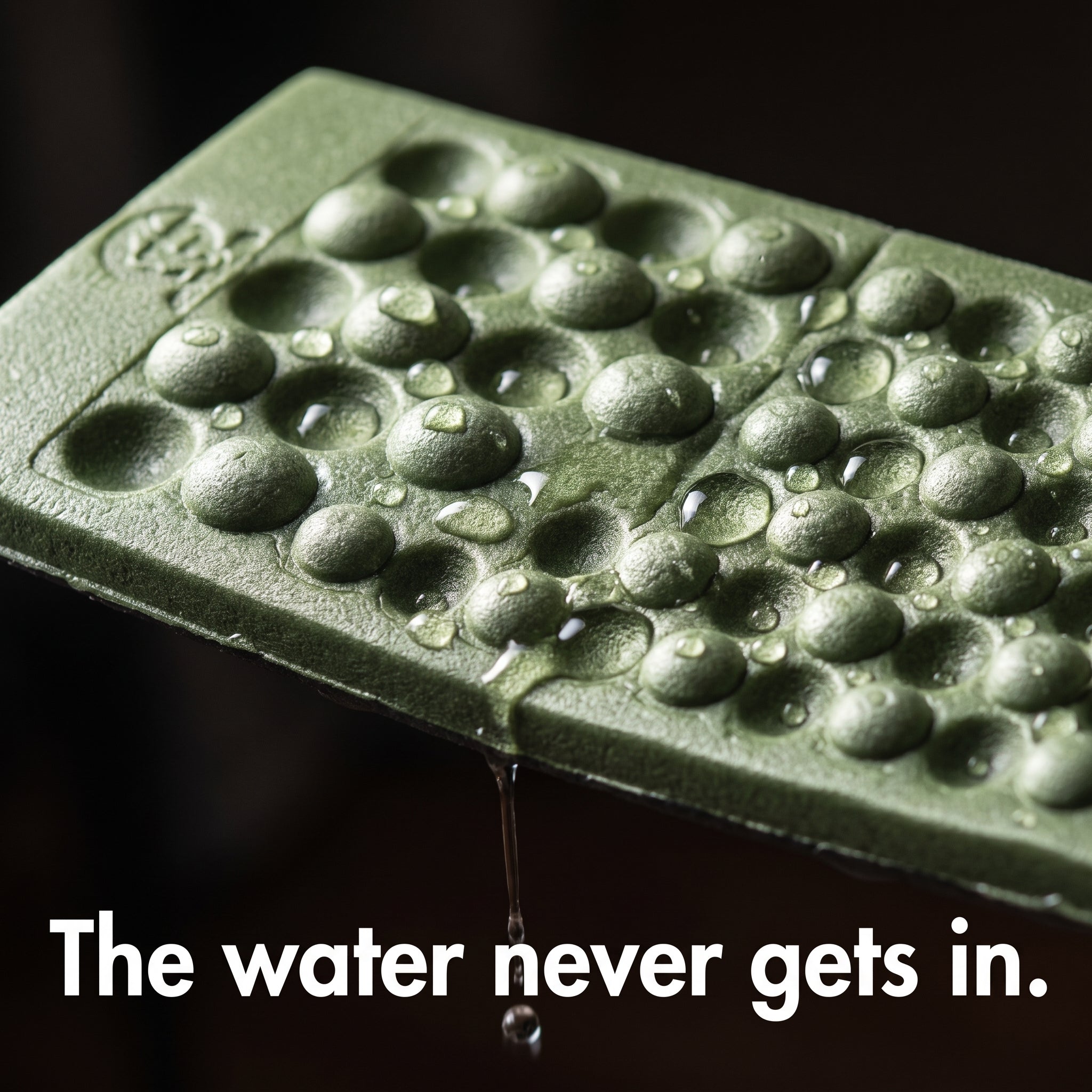 Water beading on the closed-cell foam surface of the folding sit mat