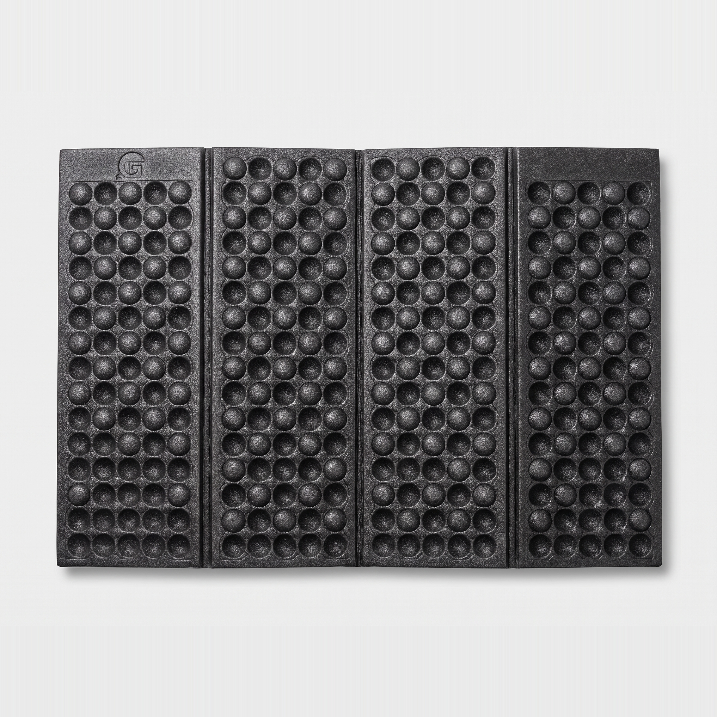Terrabound folding sit mat in black, opened out flat