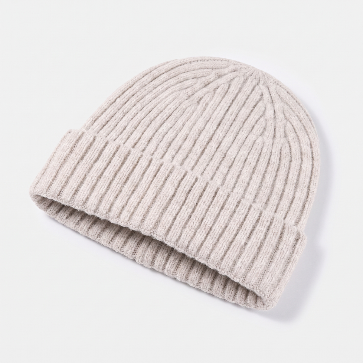 Terrabound Knit Beanie Hat in Beige - angled view