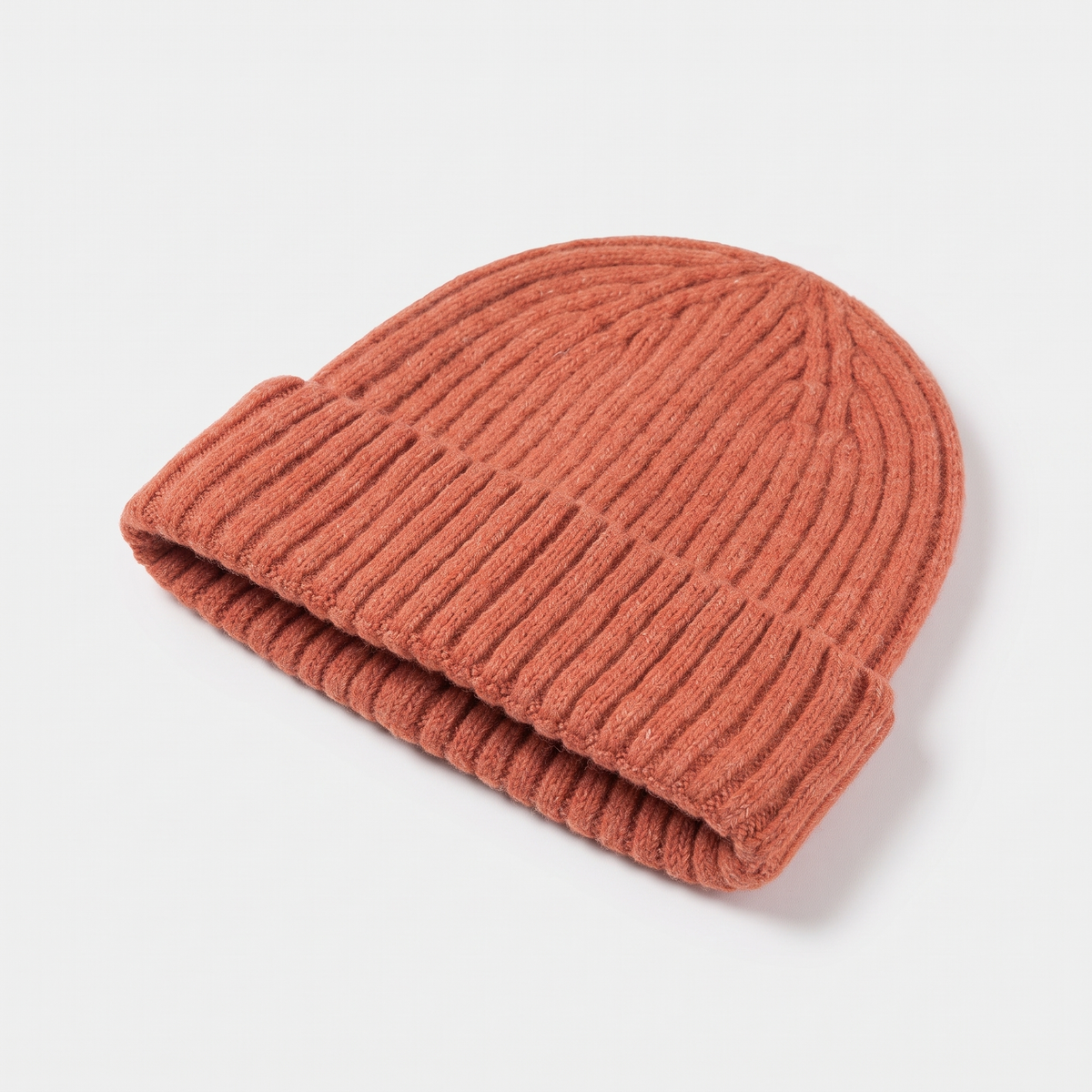 Terrabound Knit Beanie Hat in Orange - angled view