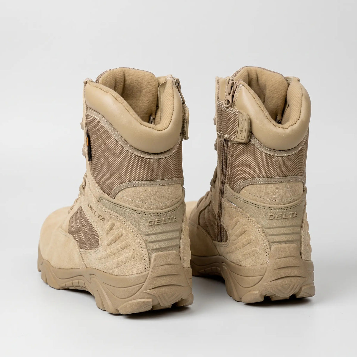Khaki combat boots from behind with padded collars