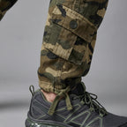 Close-up of the ankle tie cords tied over a trail shoe