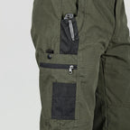 Close-up of the thigh pockets with zip pocket, phone pocket and pen slot