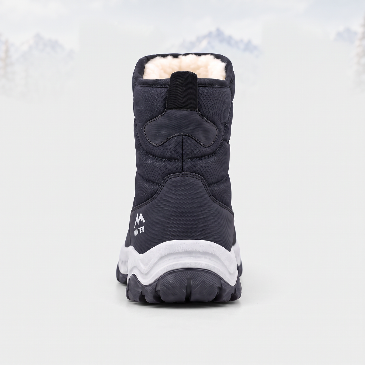 Back of the snow boot with the rear pull tab