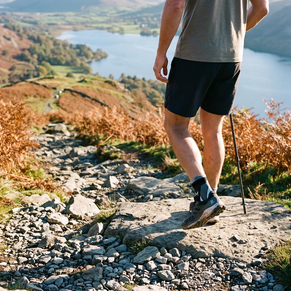 Walker wearing the ankle support brace on a rocky Lake District descent