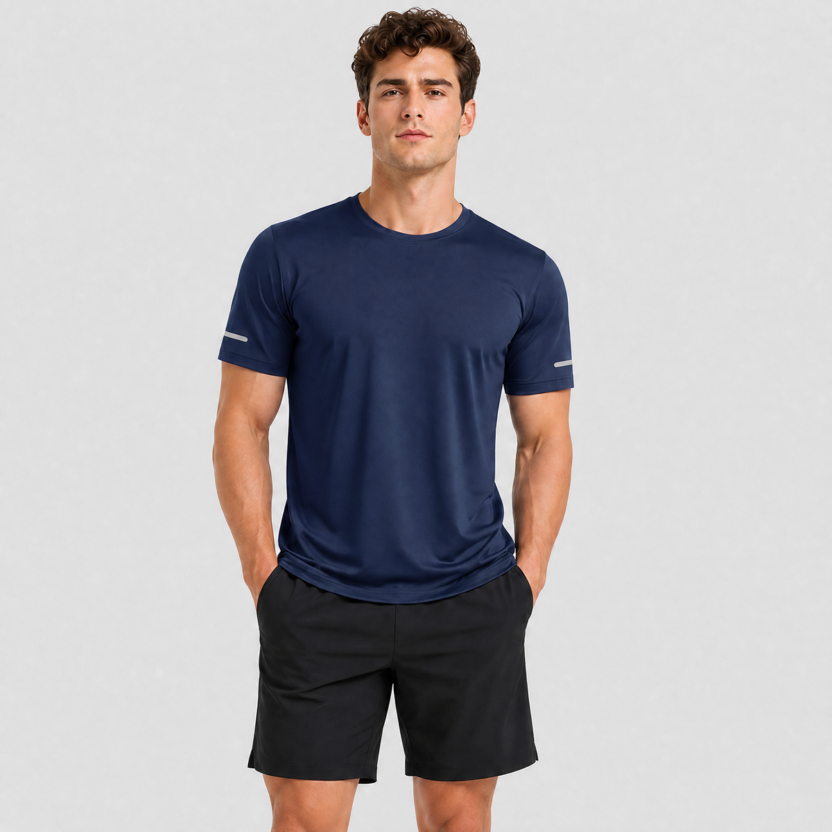 Man wearing the men's running top in Navy, front view