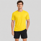Man wearing the men's running top in Yellow, front view