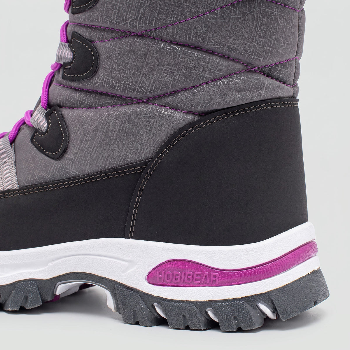 Heel detail of the Grey snow boot showing the stitched lower and cushioned midsole