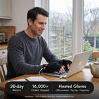 Man at a kitchen table wearing the heated gloves with 30-day returns and 16,000+ orders