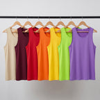 Men's running top in seven colours on a clothes rail: Light Apricot, Wine Red, Red, Orange, Yellow, Lime Green and Light Purple
