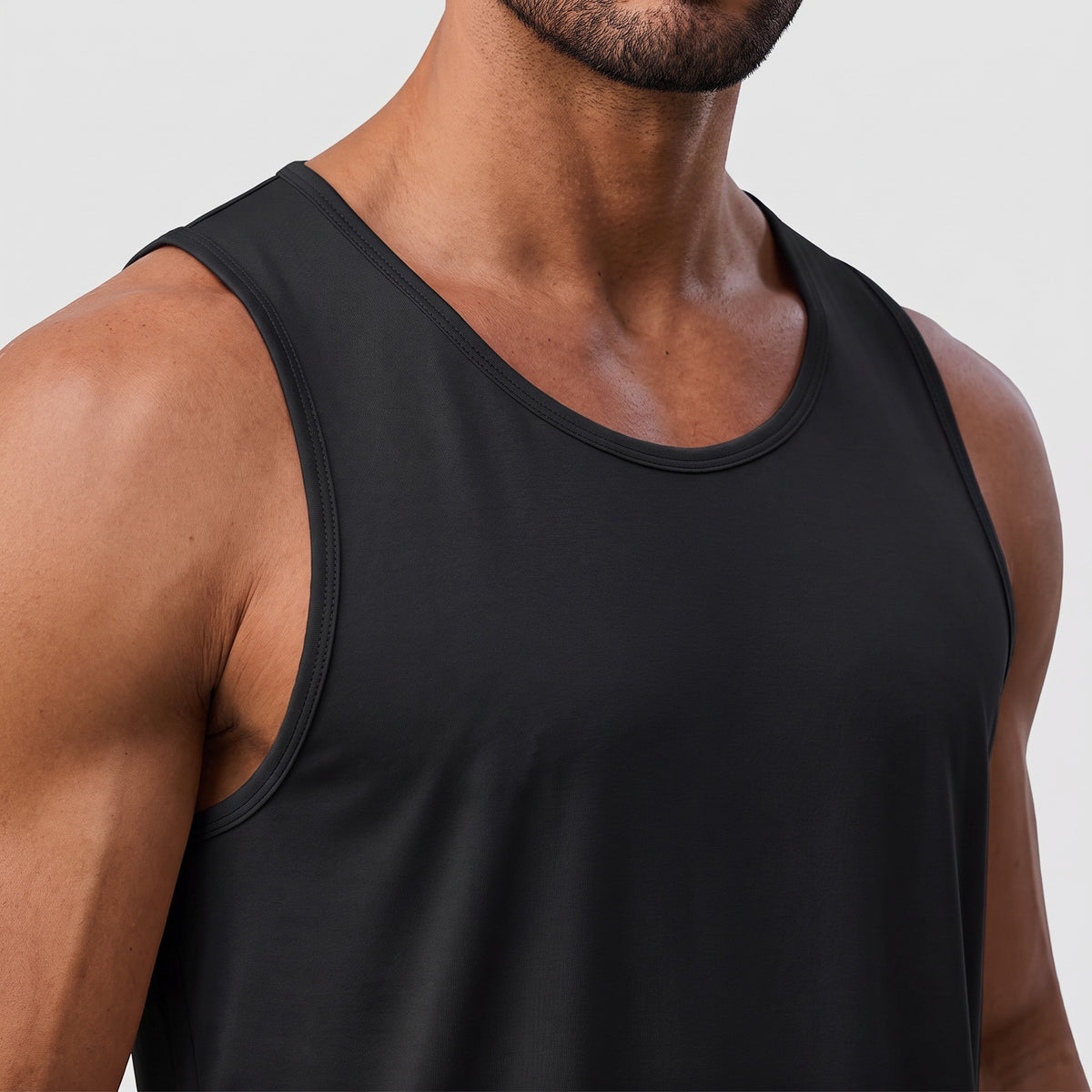 Close-up of the crew neck, shoulder strap and armhole of the men's running top