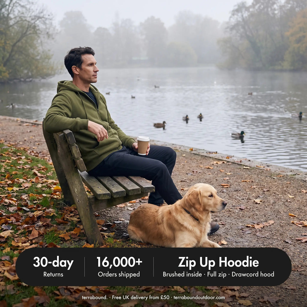 Man on a lakeside bench with his dog wearing the zip up hoodie, 30-day returns and 16,000+ orders