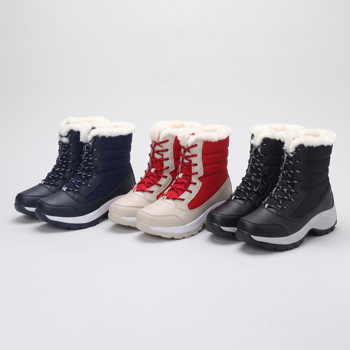 Women's platform snow boots in Navy, Red and Black, all three colours side by side
