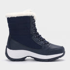 Side profile of the Navy platform snow boot showing shaft height and platform sole