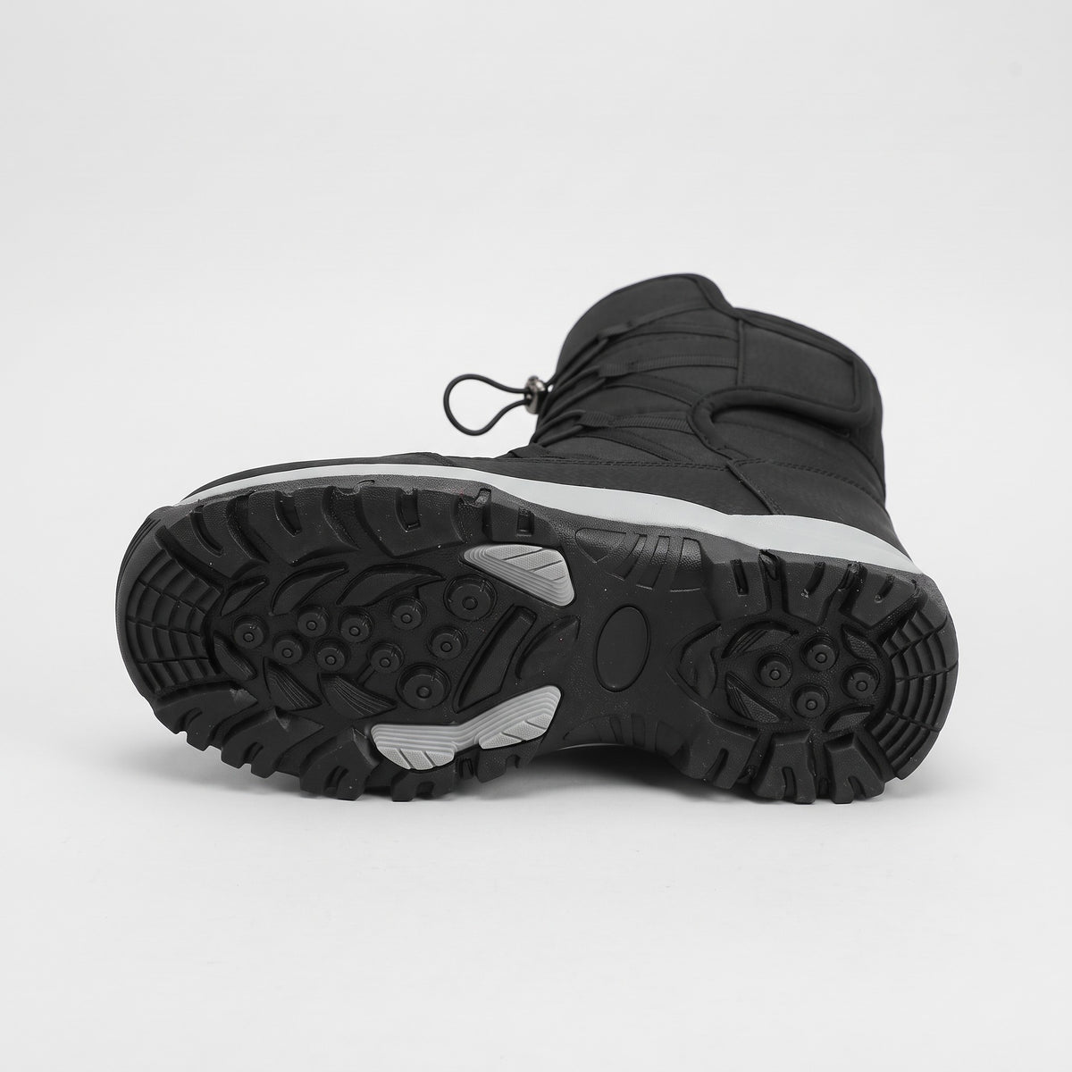 Lugged rubber outsole of the fur lined snow boots