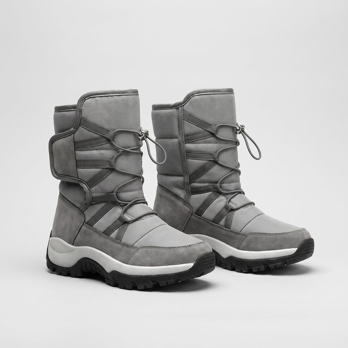 Grey fur lined snow boots with toggle lace and collar strap