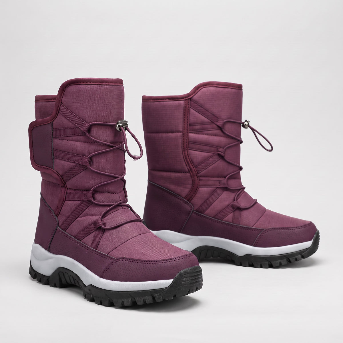 Plum fur lined snow boots with toggle lace and collar strap