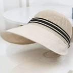 Women's sun hat in Beige with black striped band, side view