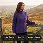 Woman at a hillside gate in the fleece: polar fleece, sizes S to 2XL, five colours, zip pockets