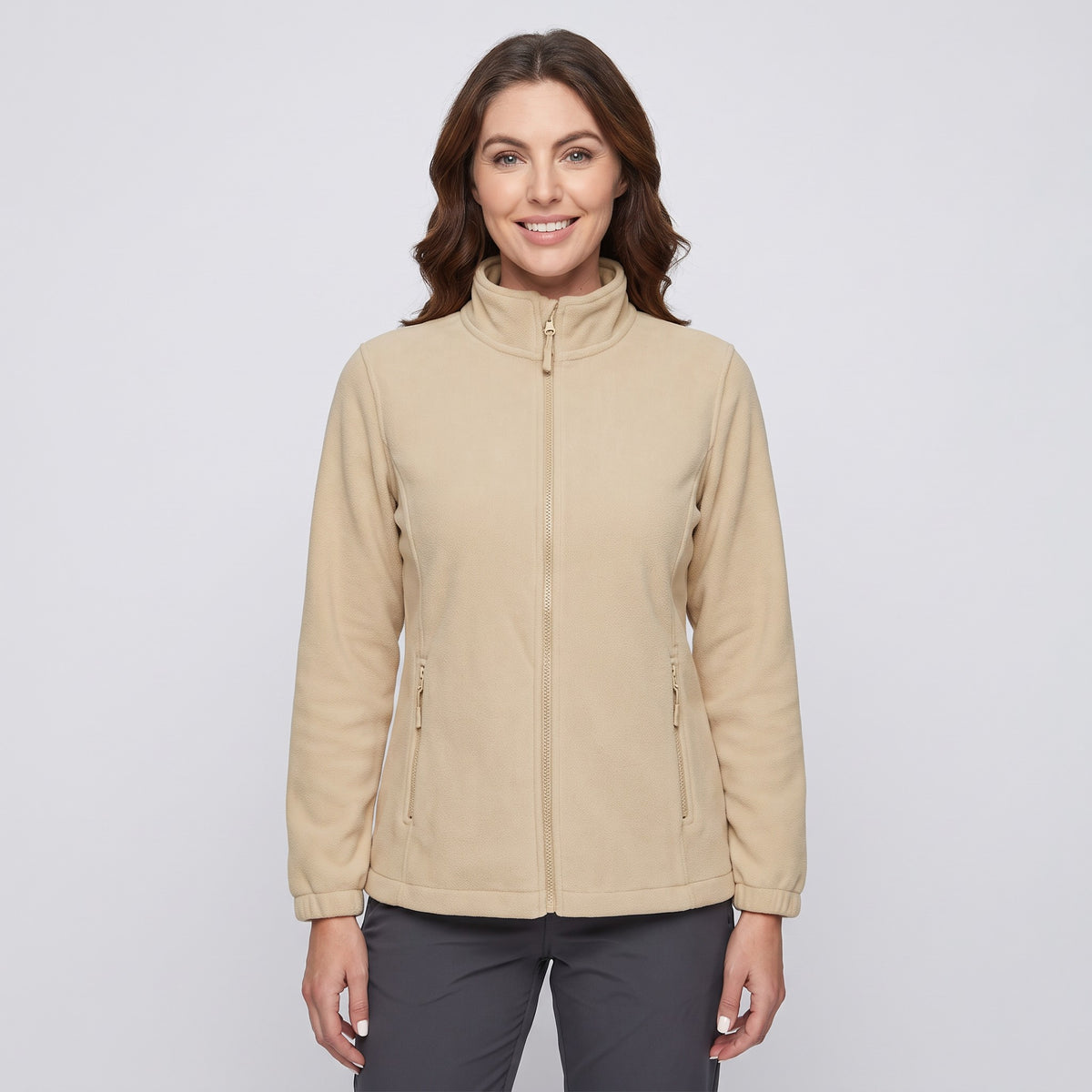 Women's fleece jacket in Beige, front view, zipped to the stand collar