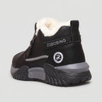 Heel end of the Black winter trainers showing the heel pull tab and plush collar