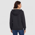 Back view of a woman wearing the Black sherpa lined zip up hoodie