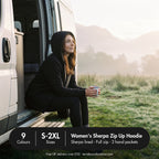 Woman in the Black sherpa zip up hoodie on a campervan step at dawn, with product facts