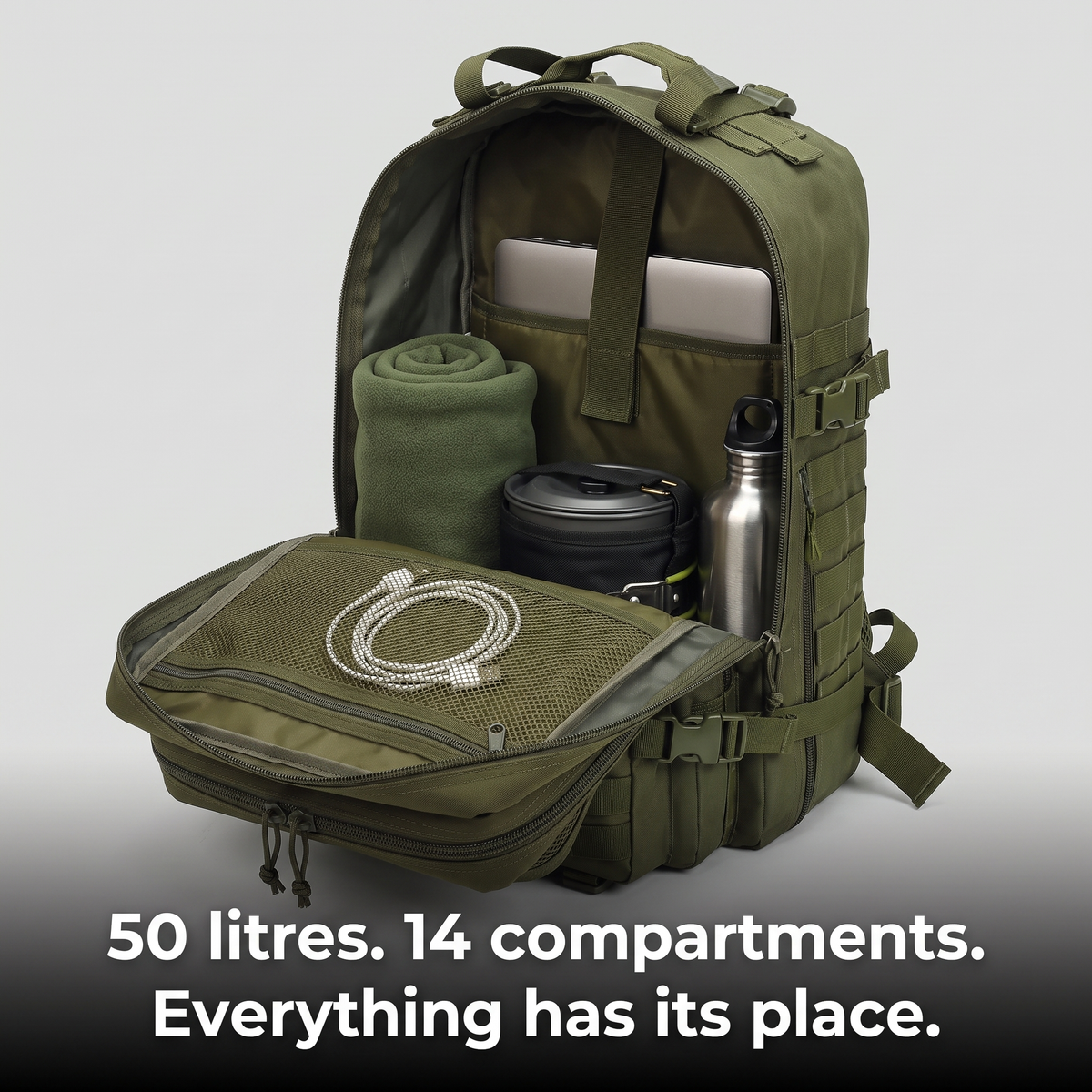 Main compartment of the 50L tactical backpack opened wide with kit packed in its own places