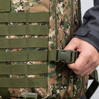 Close-up of MOLLE webbing and a side compression strap buckle on the tactical backpack