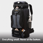 Terrabound 70L hiking rucksack with lid and front pockets open holding a head torch, phone and snacks, bottle in the side pocket